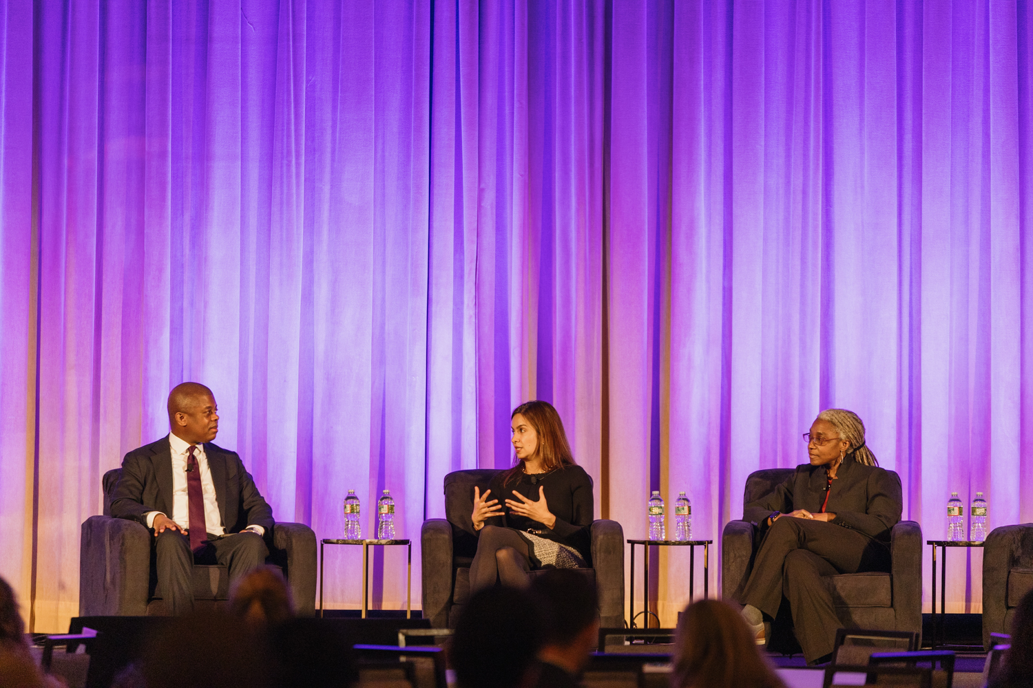 Group of panelists on stage at SEM Consortium 2025